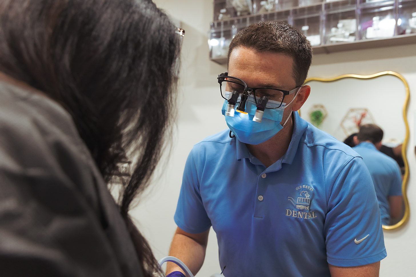 Dr. Brock Bennion treating a patient at Old Betsy Dental in Keene, TX